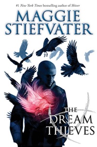 Cover of "The Dream Thieves," featuring a man with buzzed-short hair and a flock of ravens flying around him