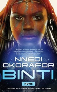 Cover o "Binti: Home," featuring a girl with dark skin and long locs of hair staring at the viewer.