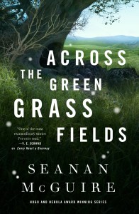 Cover of "Across the Green Grass Fields," featuring the title in white text on an image of an ancient tree in a green field.