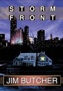 Cover of the book, featuring an ordinary-looking vacation home on the shore of a lake with the Chicago skyline and a purplish sky full of lighting behind it.