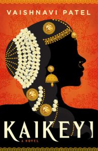 Cover of the book, featuring a silhouette of a woman in elaborate Indian jewelry (golden headband with teardrop hanging over the forehead, large earrings, nose ring, gold and pearls braided into her hair) on an orange background.