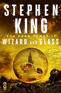 Cover of the book, featuring a bird skull suspended in a clear glass orb. Behind it is a barren landscape of dark rock and a sky full of yellow clouds; a dark tower with many spires can be seen through the glass behind the skull, far away and half faded into the yellow clouds.